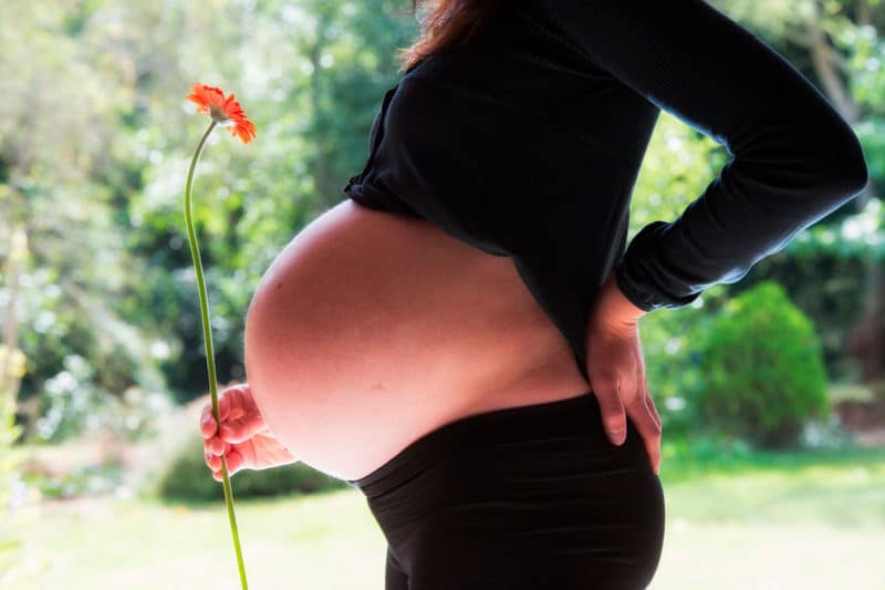 Does the shape of your pregnant belly reveal if your baby will be a boy or a girl?